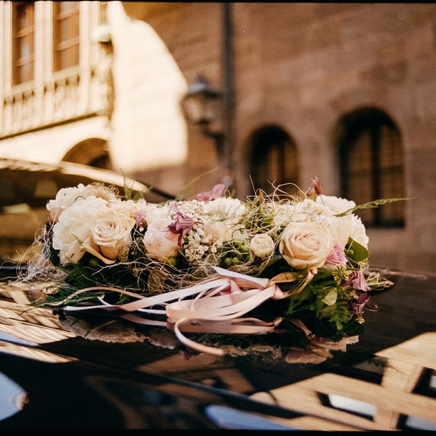 Wedding flowers on the limousine